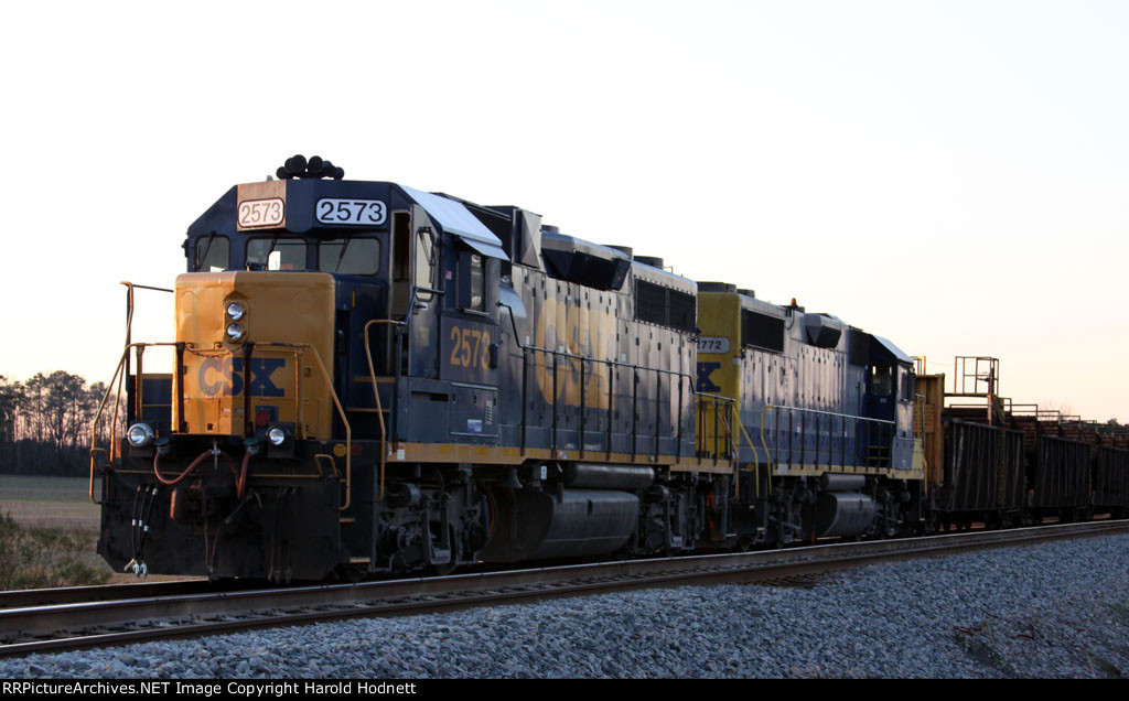 Train F015 with CSX 2573 & 2772 are tied down in the siding